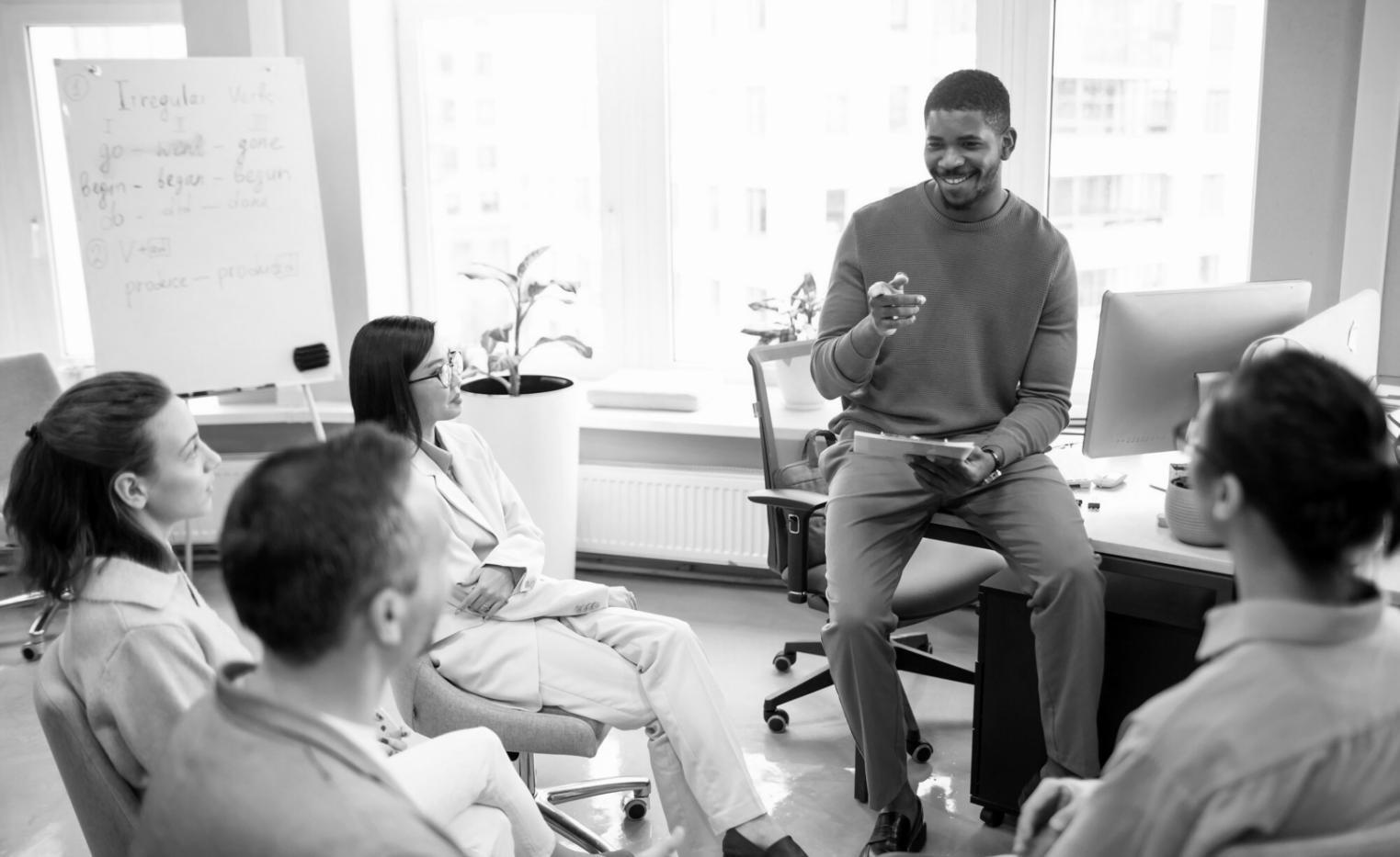 Small business owner reviewing financial documents in office